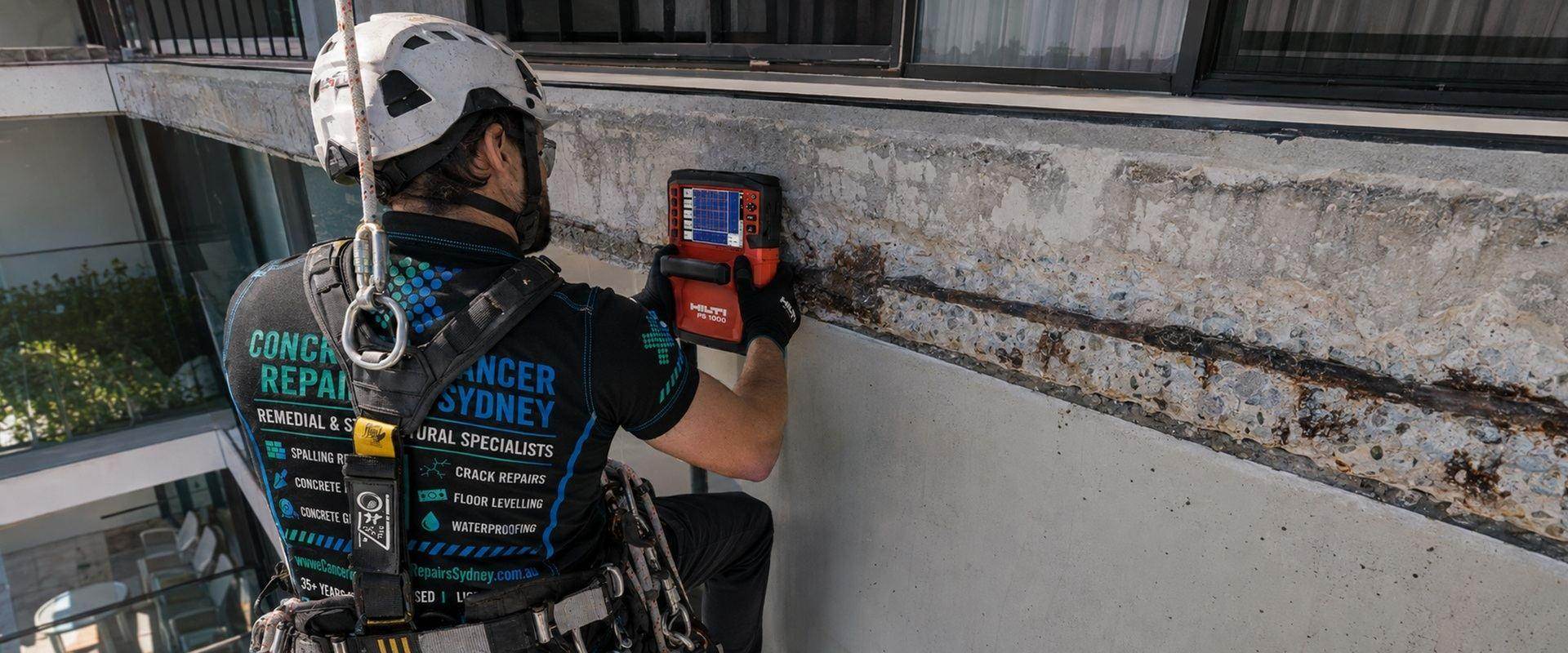 Before repair — High-Rise Apartment Façade & Slab Edge Concrete Cancer Remediation
